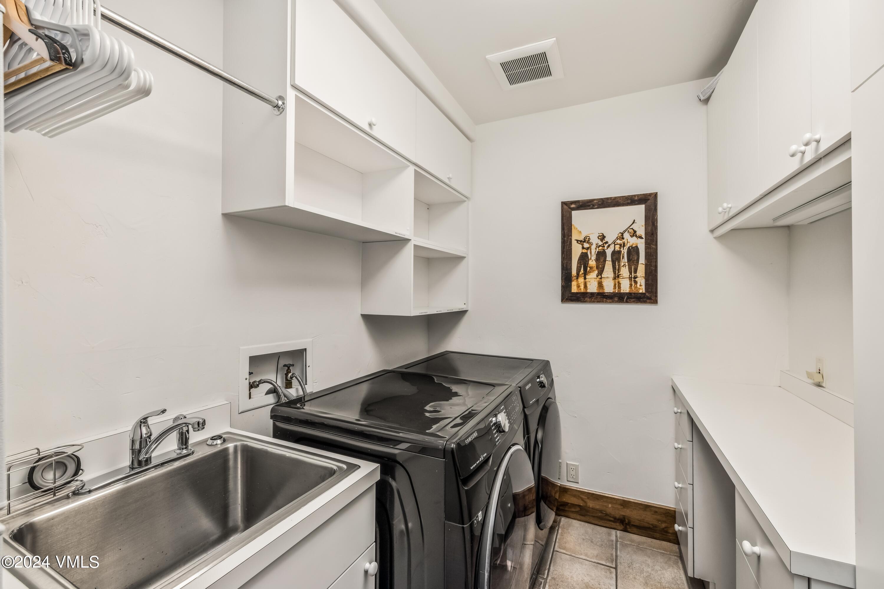 48 Jasmine Avon, CO 81620 - Photo 47 of 67 a kitchen with stainless steel appliances granite countertop a sink stove and refrigerator
