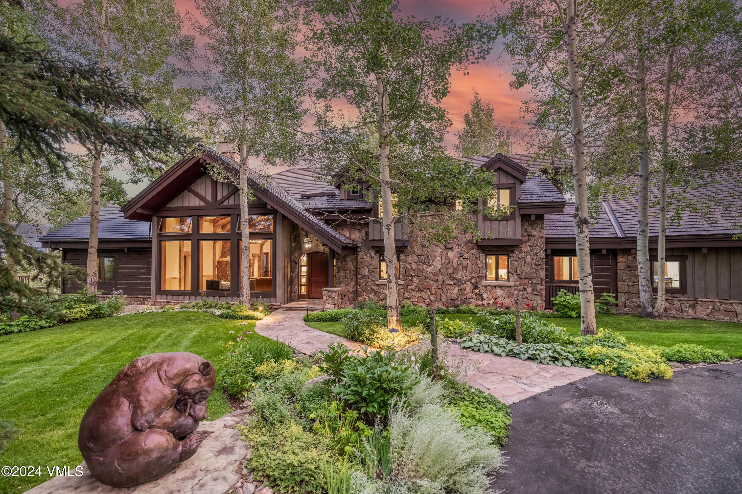 48 Jasmine Avon, CO 81620 - Photo 5 of 67 a front view of a house with a yard and garage