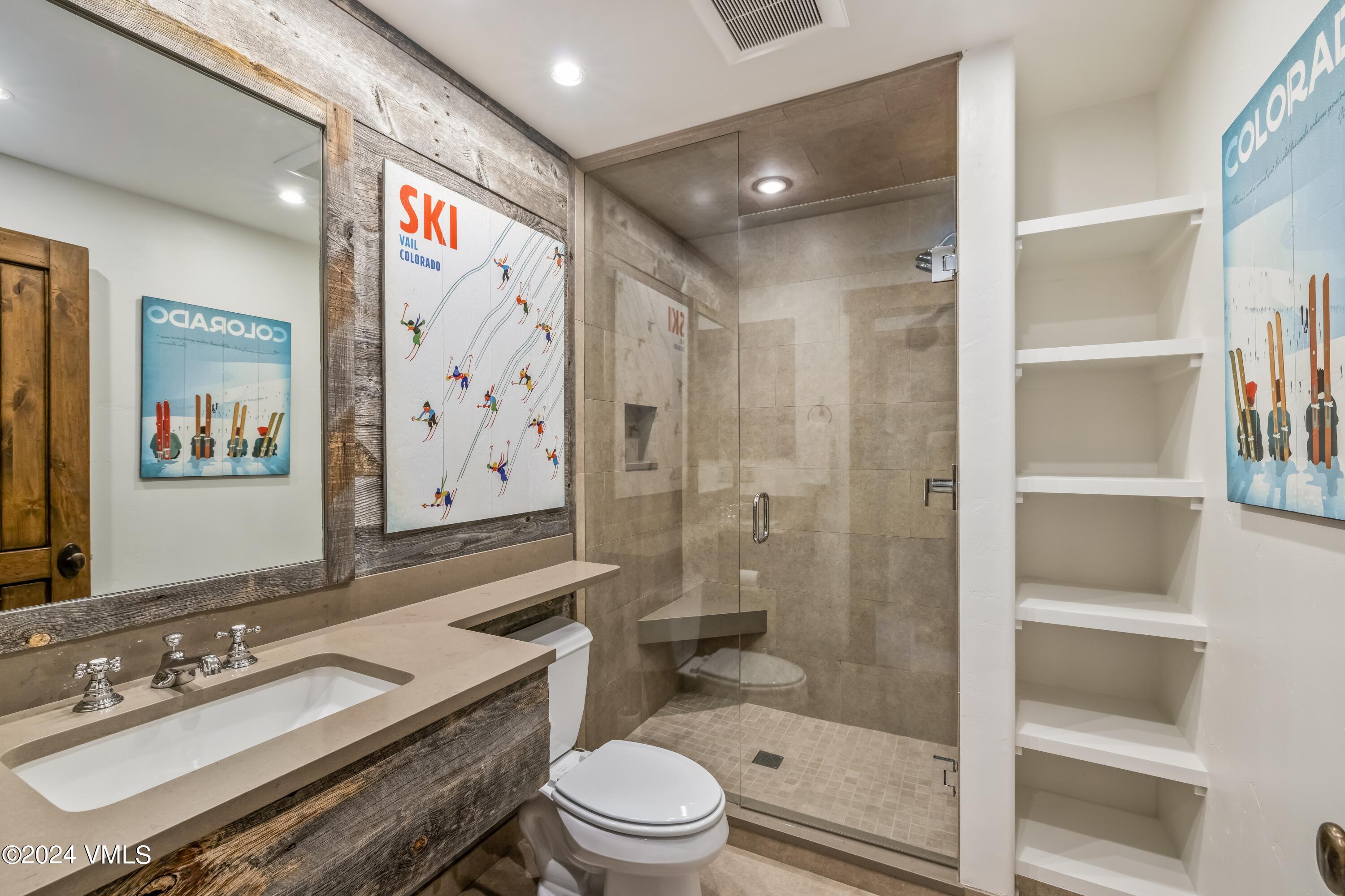 48 Jasmine Avon, CO 81620 - Photo 51 of 67 a bathroom with a sink a toilet and shower