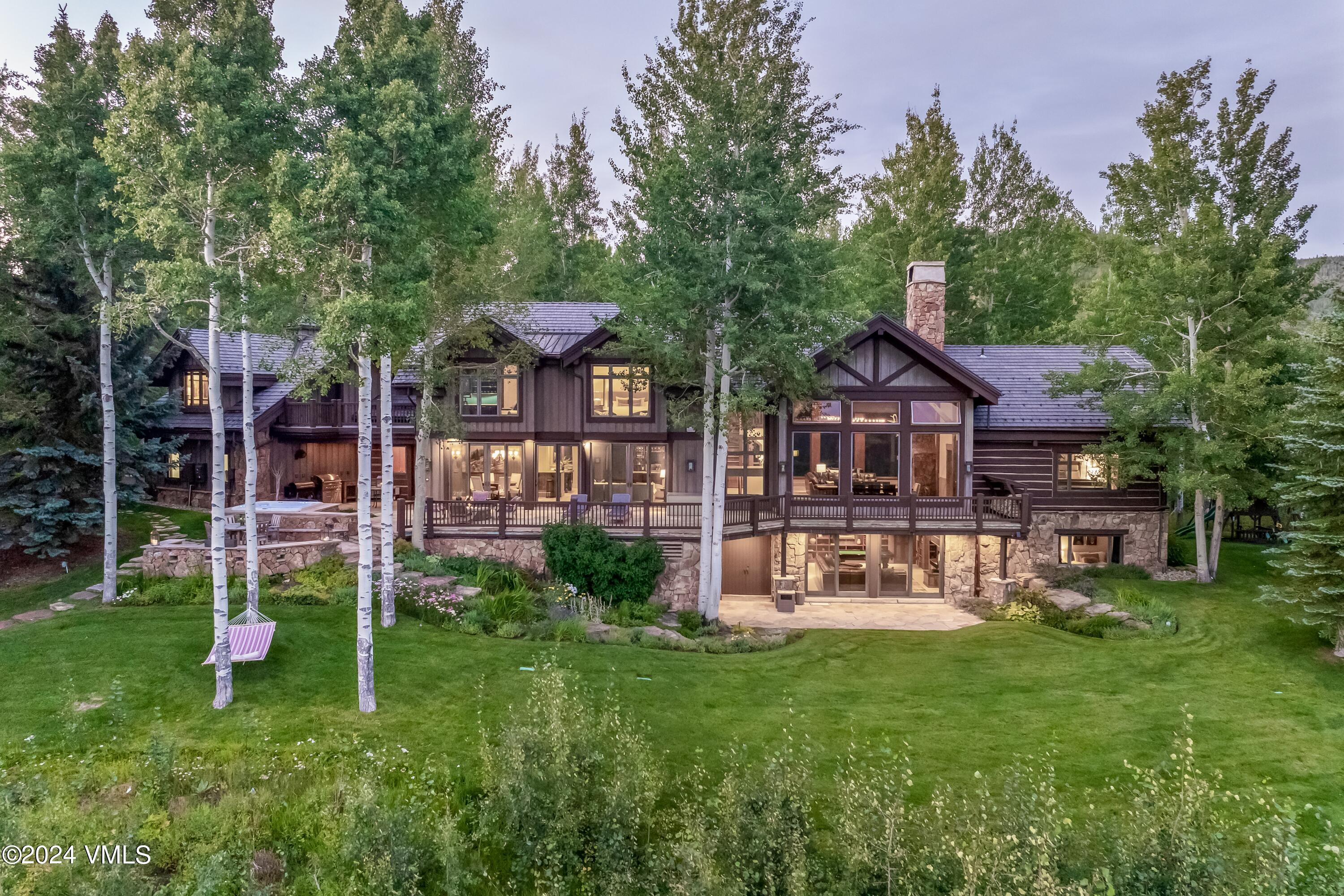 48 Jasmine Avon, CO 81620 - Photo 6 of 67 a front view of a house with garden