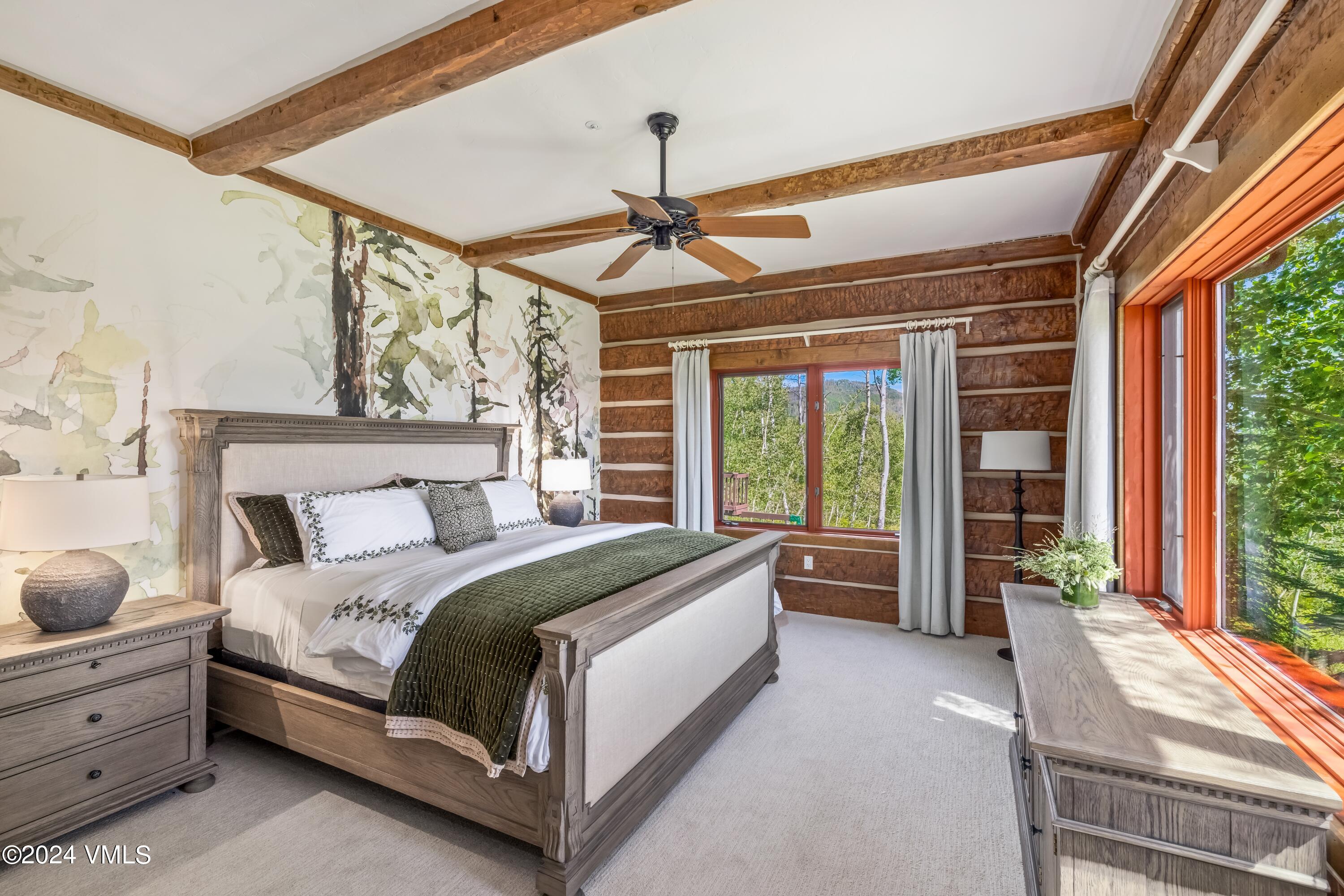 48 Jasmine Avon, CO 81620 - Photo 61 of 67 a bed room with a bed and a large window