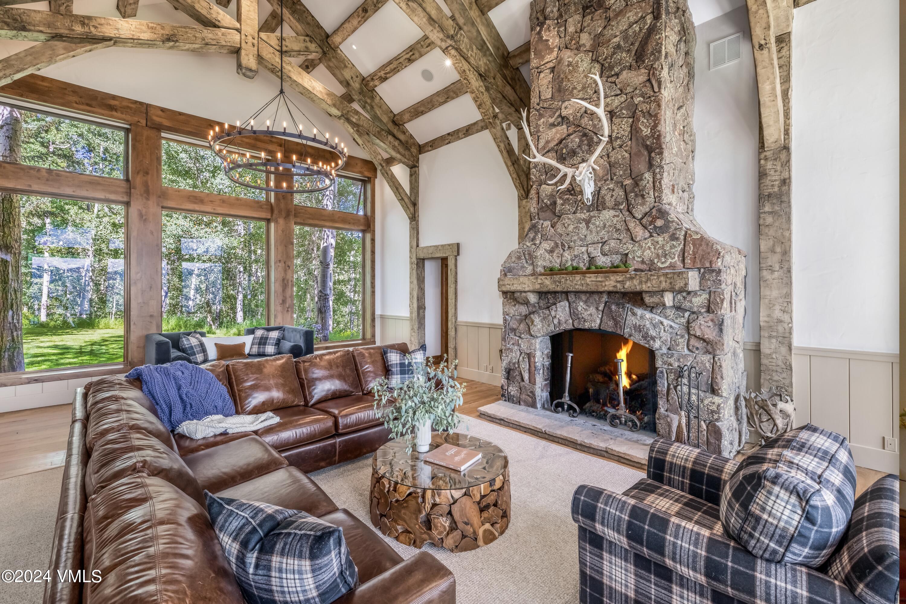 48 Jasmine Avon, CO 81620 - Photo 9 of 67 a living room with furniture and a fireplace