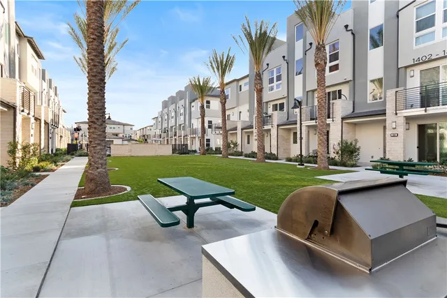 a view of a big yard with furniture