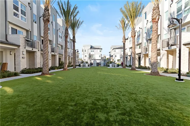 a view of a patio with a yard