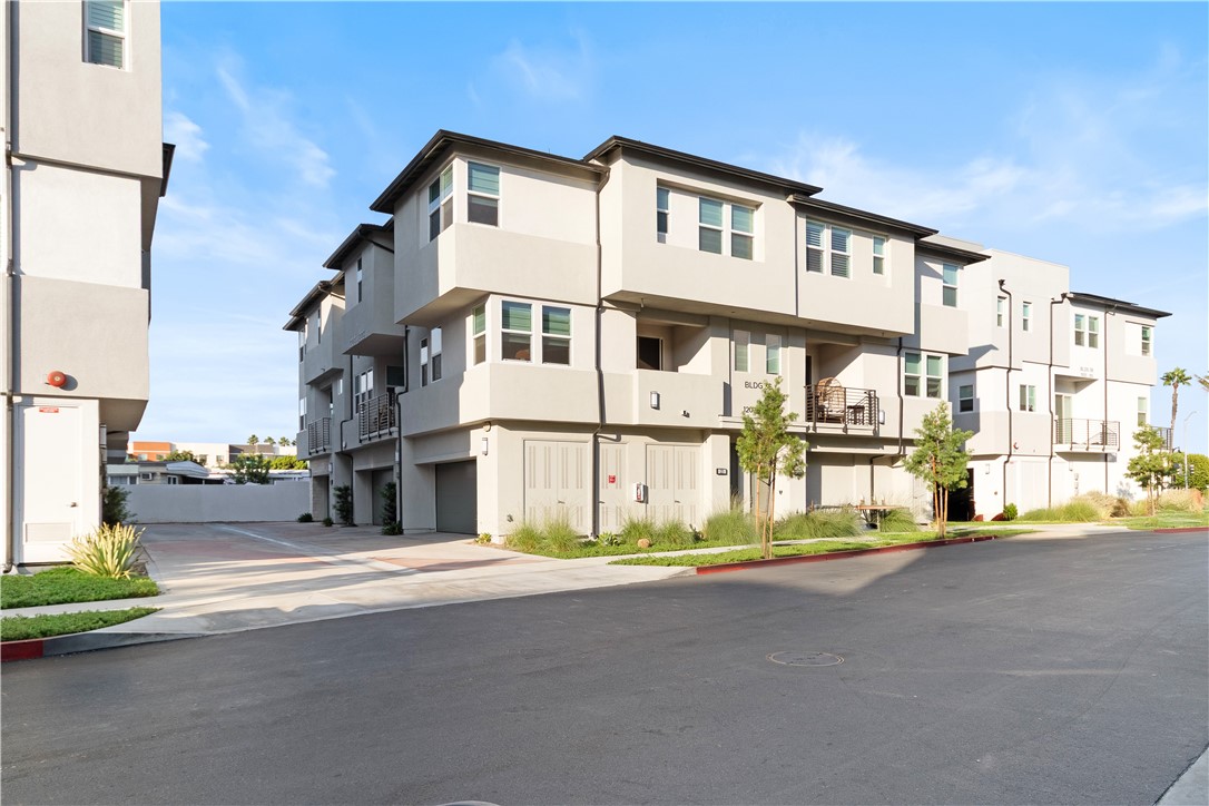 1215 West Bushell Street Anaheim, CA 92805 - Photo 18 of 24 a front view of a building with street view