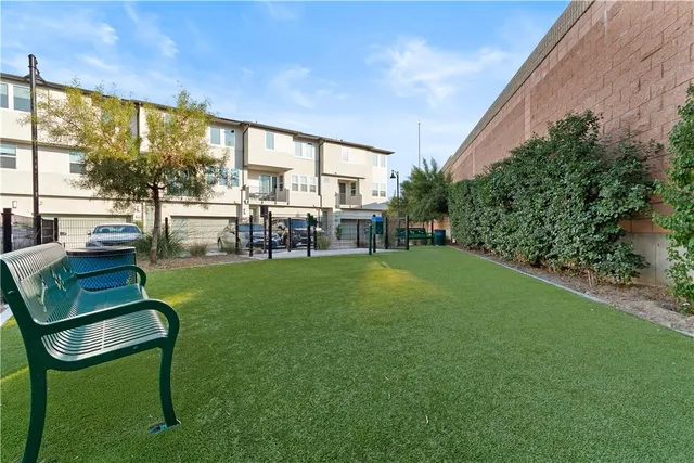 a view of a big yard with furniture