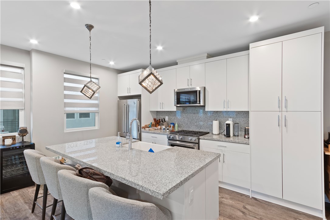 1215 West Bushell Street Anaheim, CA 92805 - Photo 6 of 24 Chef ready kitchen with premium appliances and farmhouse sink