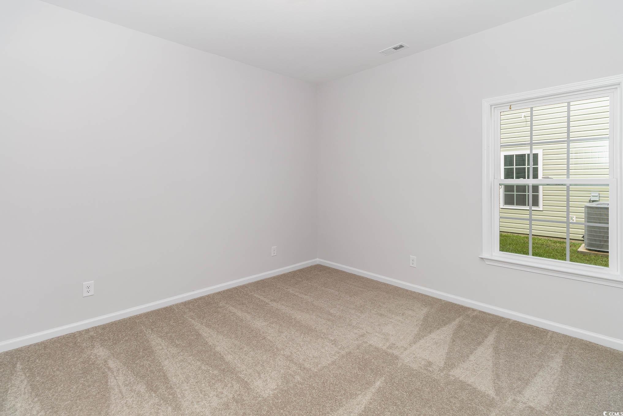 323 Lakota Loop Longs, SC 29568 - Photo 5 of 19 View of carpeted empty room