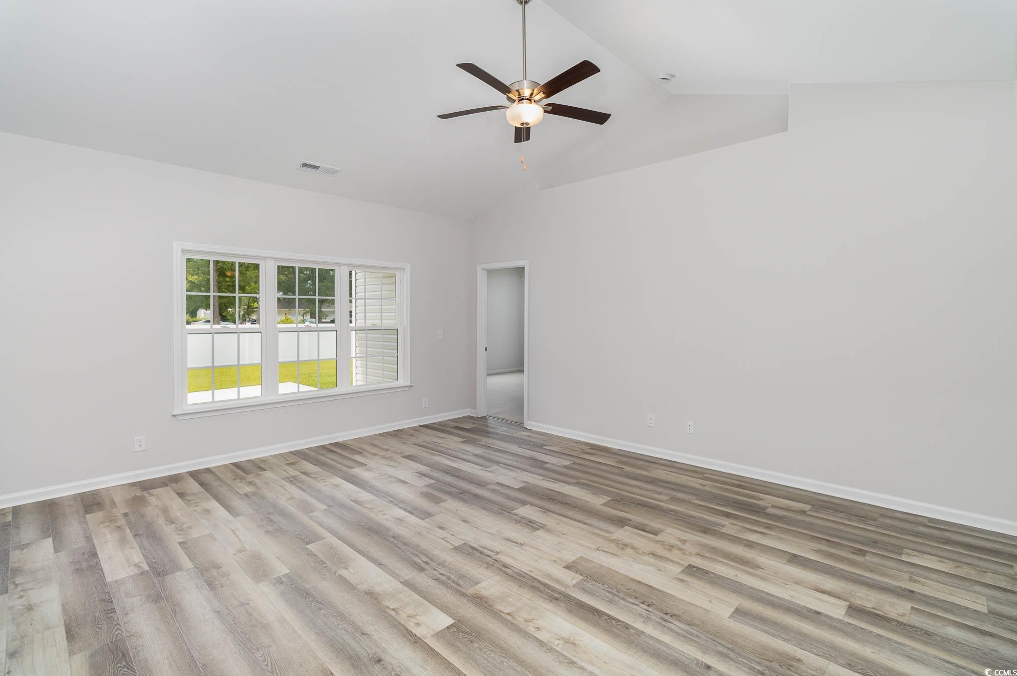 323 Lakota Loop Longs, SC 29568 - Photo 8 of 19 Spare room featuring high vaulted ceiling, ceiling