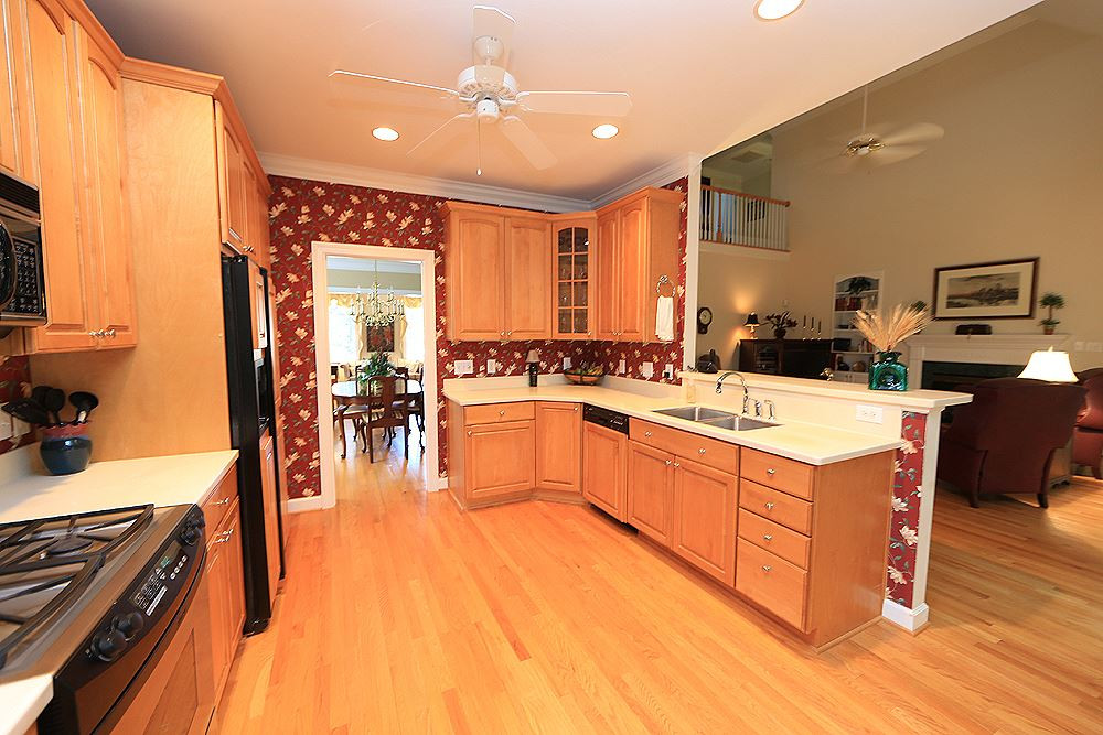 2516 Wertherson Lane Raleigh, NC 27613 - Photo 25 of 25 Kitchen is open to the family room, easy living floor plan. Kitchen