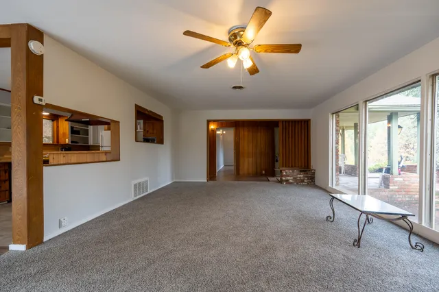 a view of a livingroom with a flat screen tv
