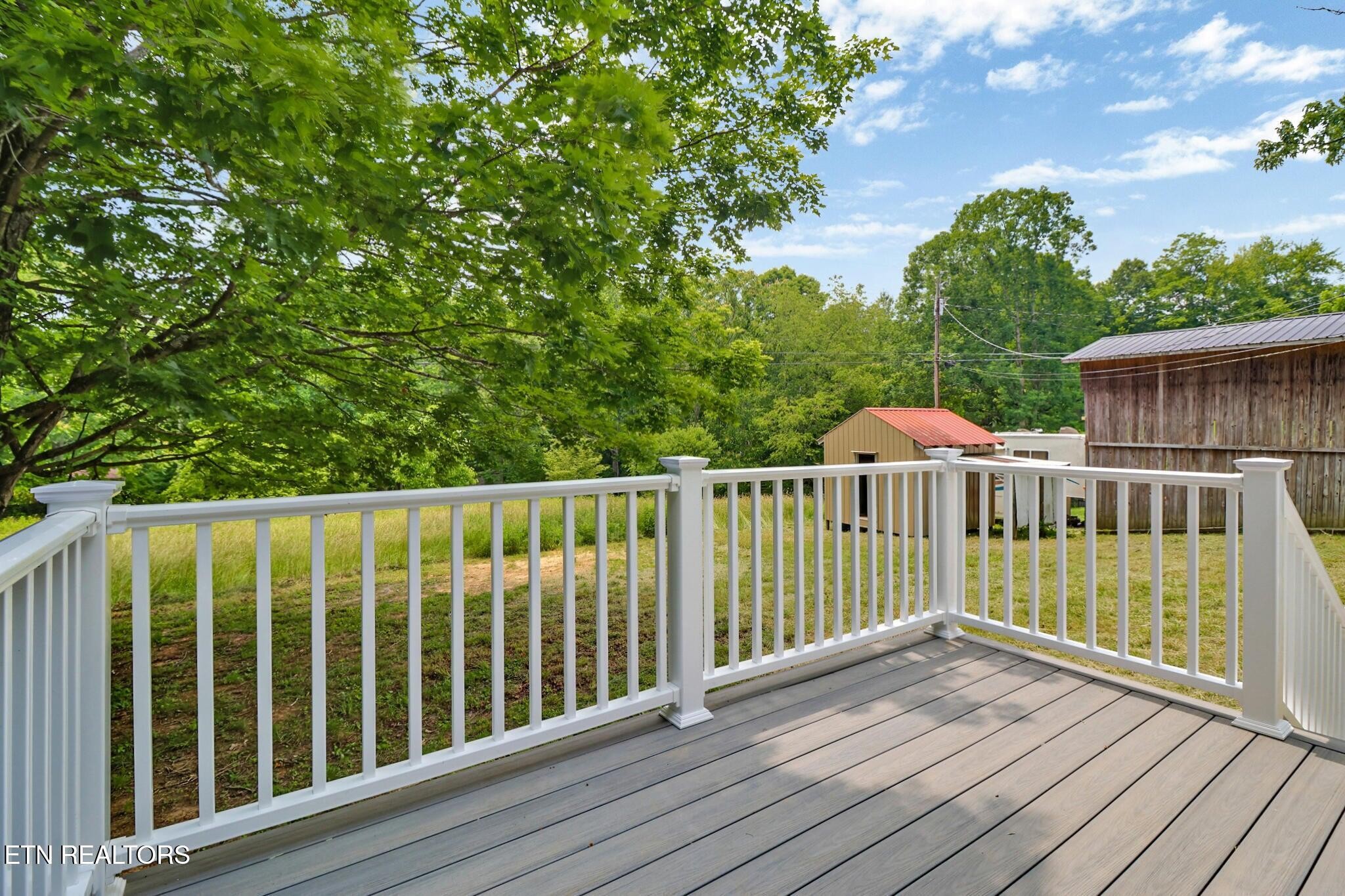 1095 Franklin Road Jamestown, TN 38556 - Photo 11 of 31 a view of a wooden roof deck