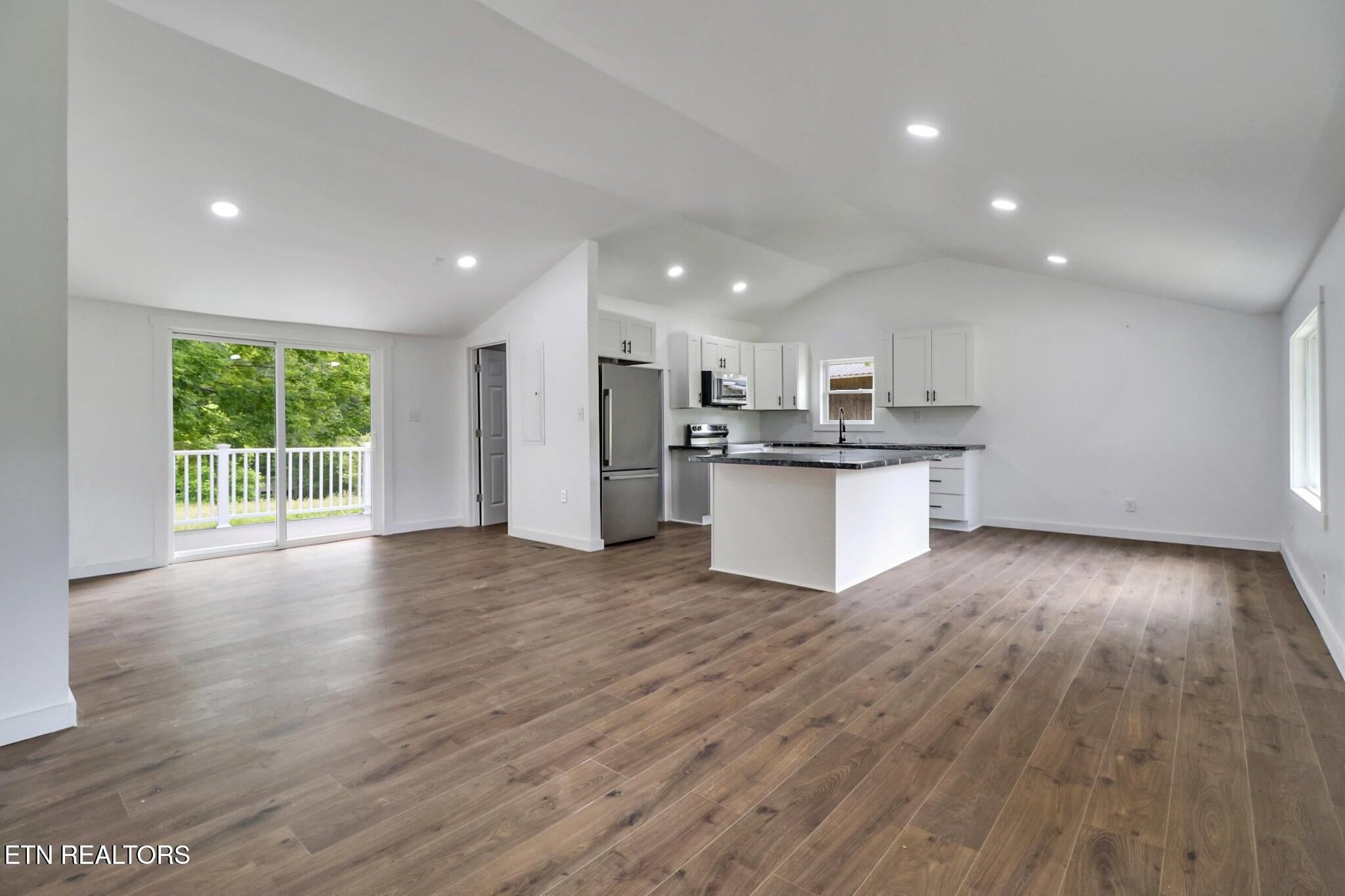 1095 Franklin Road Jamestown, TN 38556 - Photo 12 of 31 a view of kitchen with wooden floor and electronic appliances