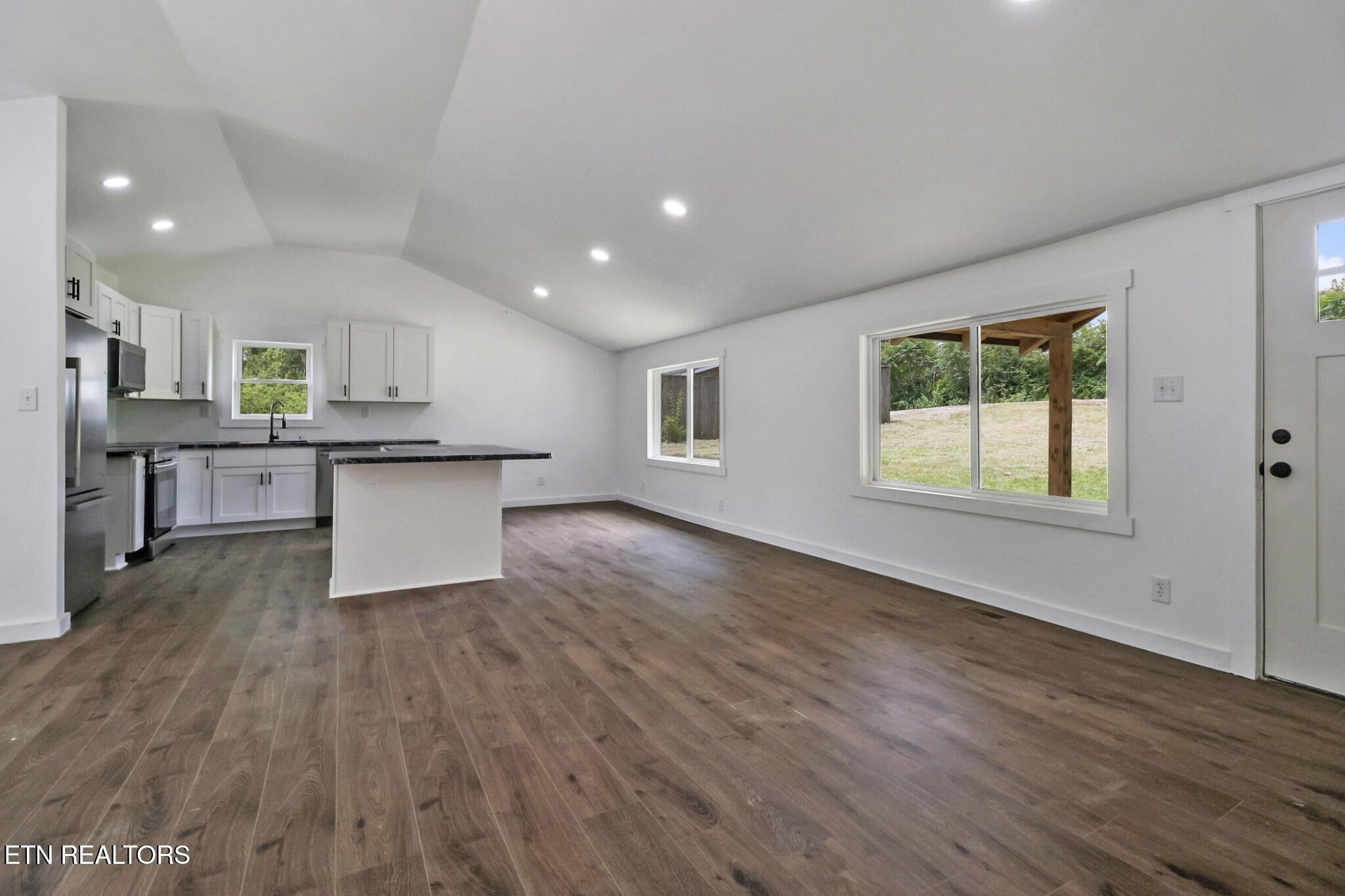 1095 Franklin Road Jamestown, TN 38556 - Photo 15 of 31 a view of kitchen with wooden floor and electronic appliances