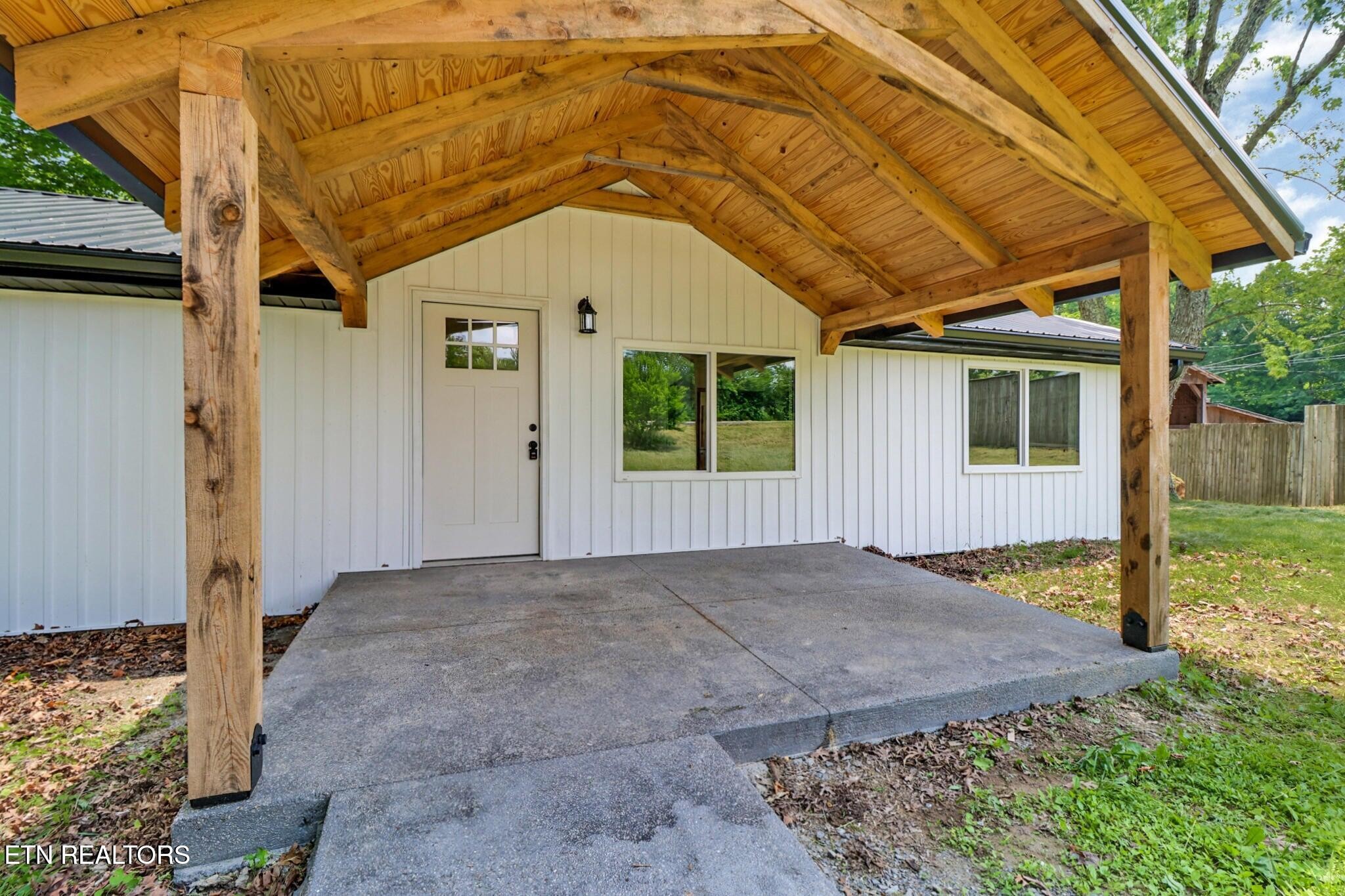1095 Franklin Road Jamestown, TN 38556 - Photo 4 of 31 a view of backyard with small cabin