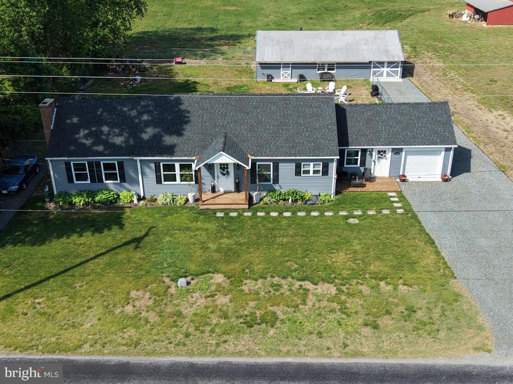 25485 Hignutt Road Denton, MD 21629 - Photo 41 of 52 front view of a house with a yard