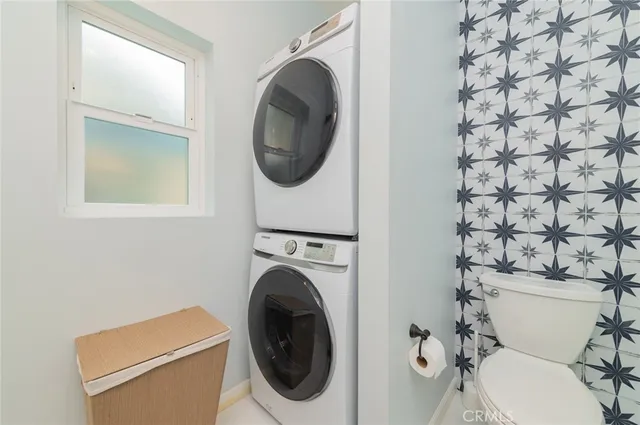 a bathroom with a toilet and a sink