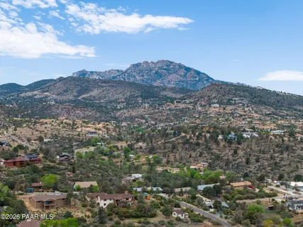 an aerial view of residential house and green space