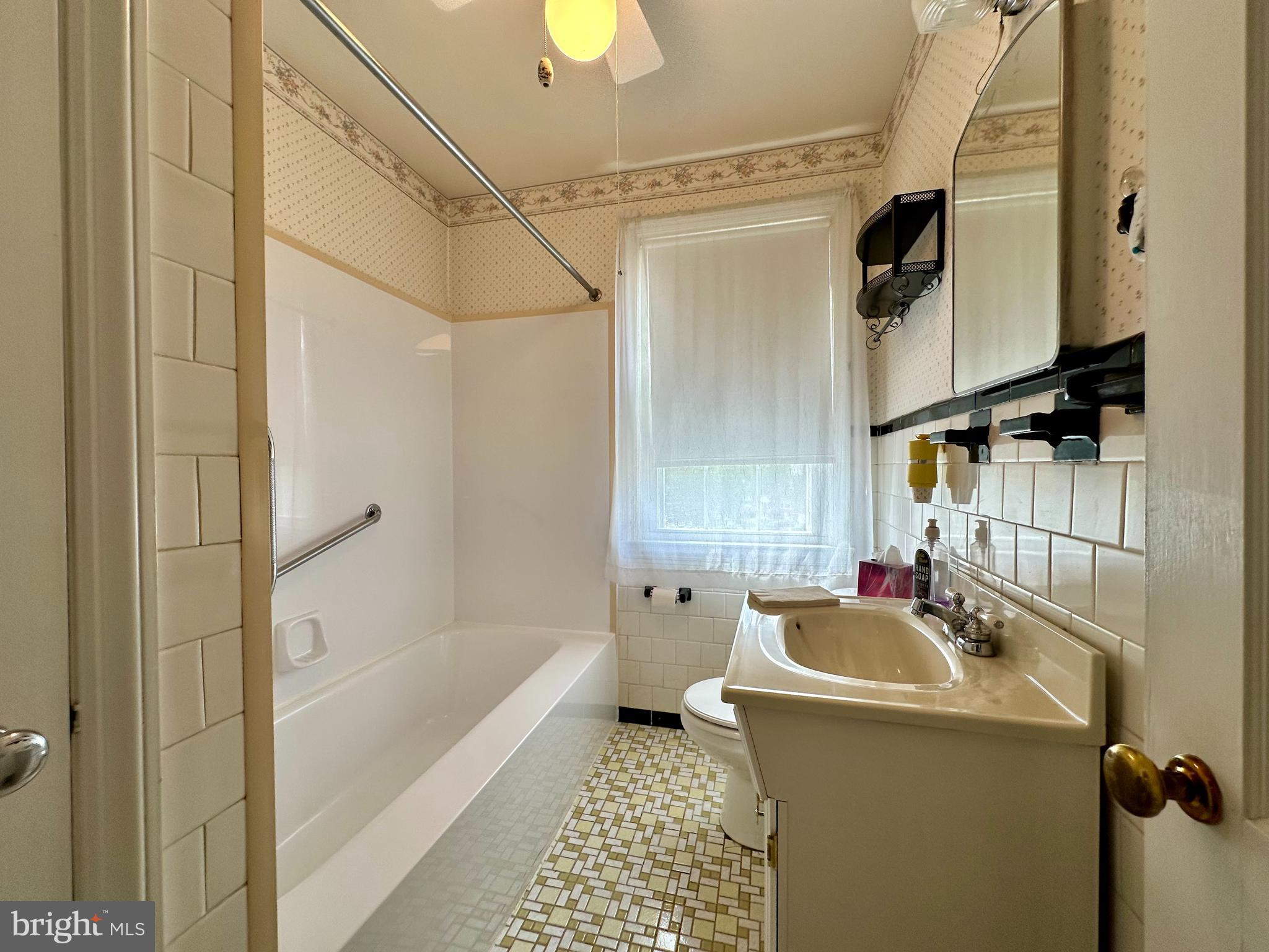 1720 Edgewood Road Towson, MD 21286 - Photo 26 of 50 Upstairs full bath with tub enclosure