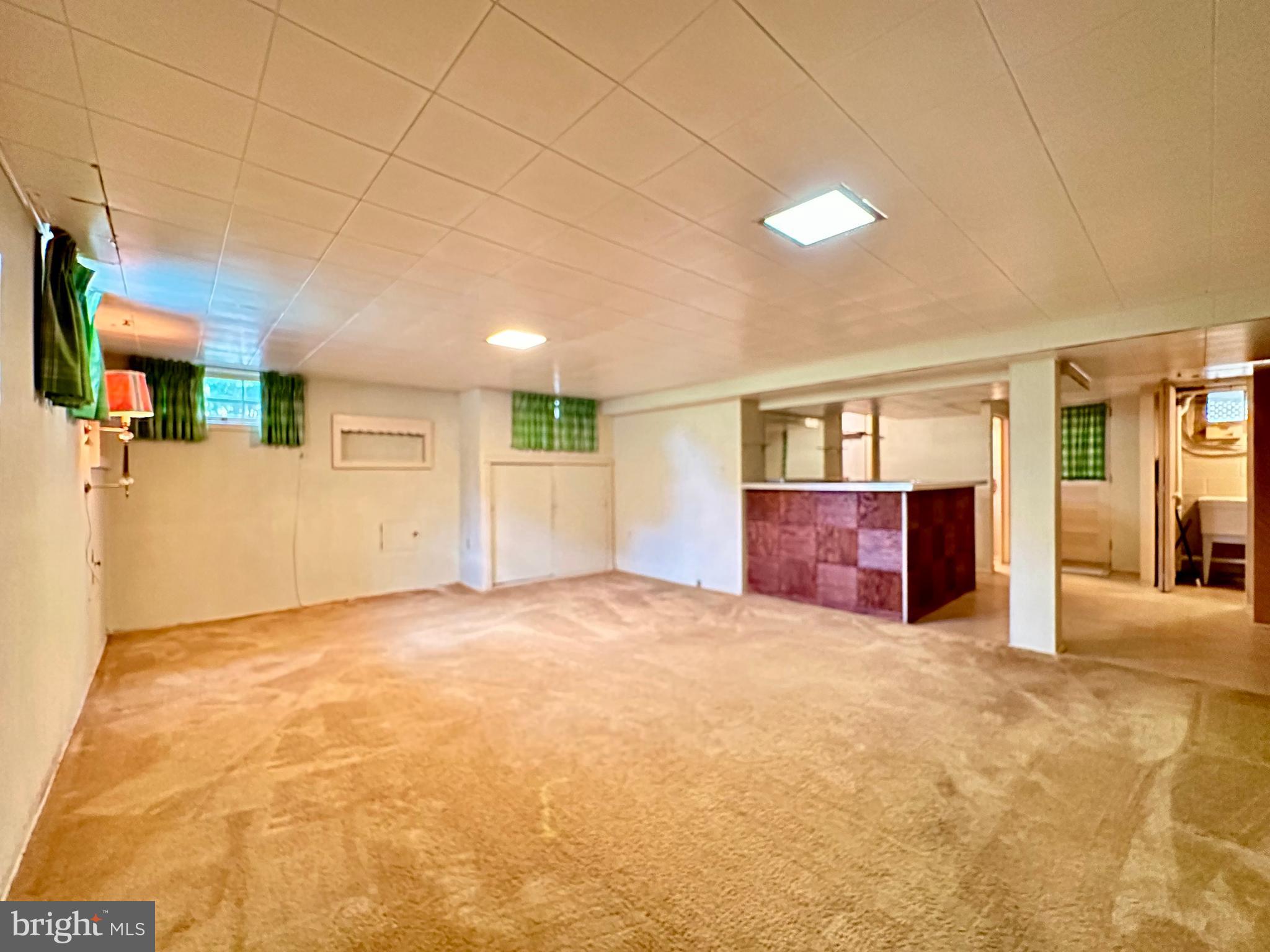 1720 Edgewood Road Towson, MD 21286 - Photo 43 of 50 Basement rec room and wet bar
