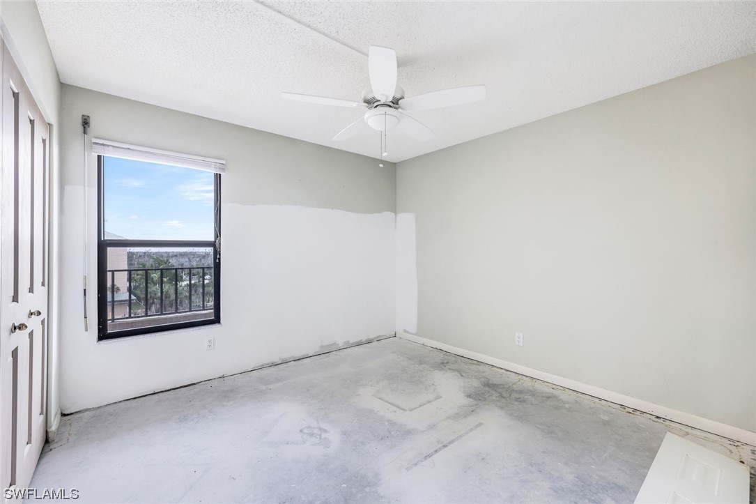15021 Punta Rassa Road, Unit 504 Fort Myers, FL 33908 - Photo 18 of 24 an empty room with a window