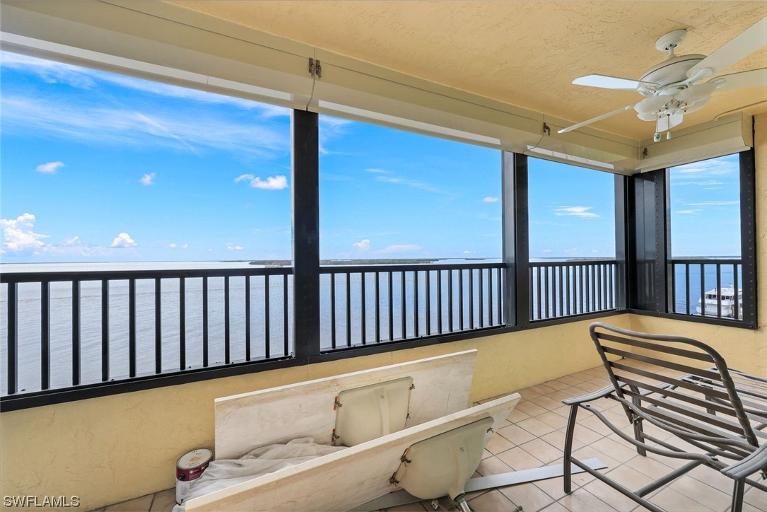 15021 Punta Rassa Road, Unit 504 Fort Myers, FL 33908 - Photo 3 of 24 a view of a balcony with furniture
