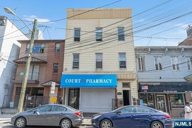 an aerial view of city and lake