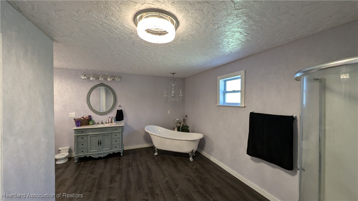3605 Rabbit Run Road Wauchula, FL 33873 - Photo 35 of 50 a bathroom with a sink mirror and vanity