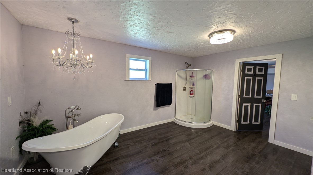 3605 Rabbit Run Road Wauchula, FL 33873 - Photo 36 of 50 a view of a hallway with furniture and a chandelier