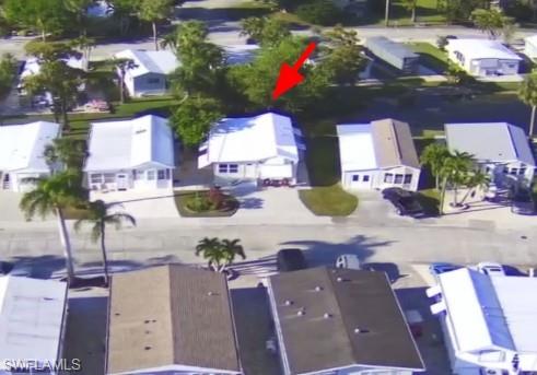 233 Cattleya Refuge, Unit 233 Naples, FL 34114 - Photo 25 of 48 an aerial view of a house with outdoor space