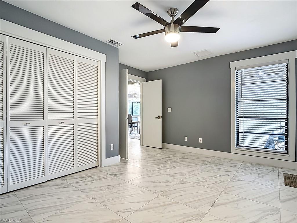 183 Round Key Circle, Unit D4 Naples, FL 34112 - Photo 28 of 49 a view of an empty room with a window