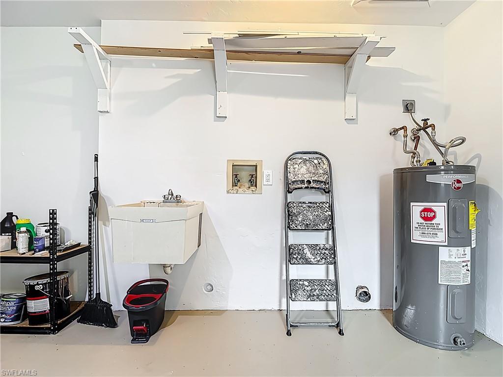183 Round Key Circle, Unit D4 Naples, FL 34112 - Photo 39 of 49 a view of storage and utility room