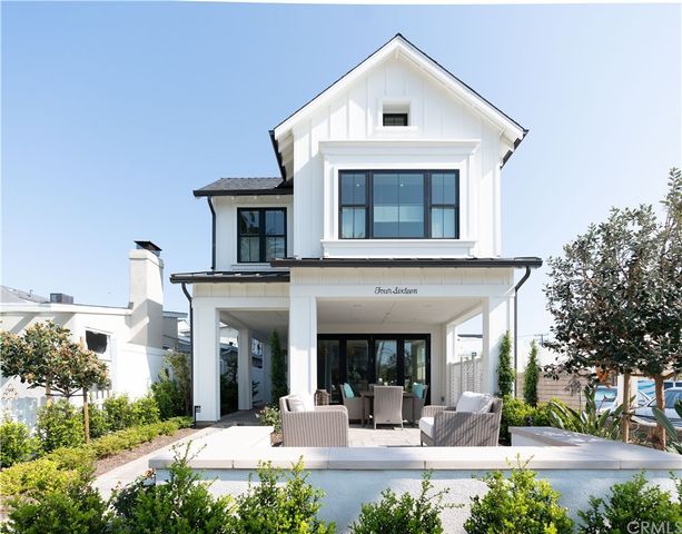 a view of a house with entrance gate