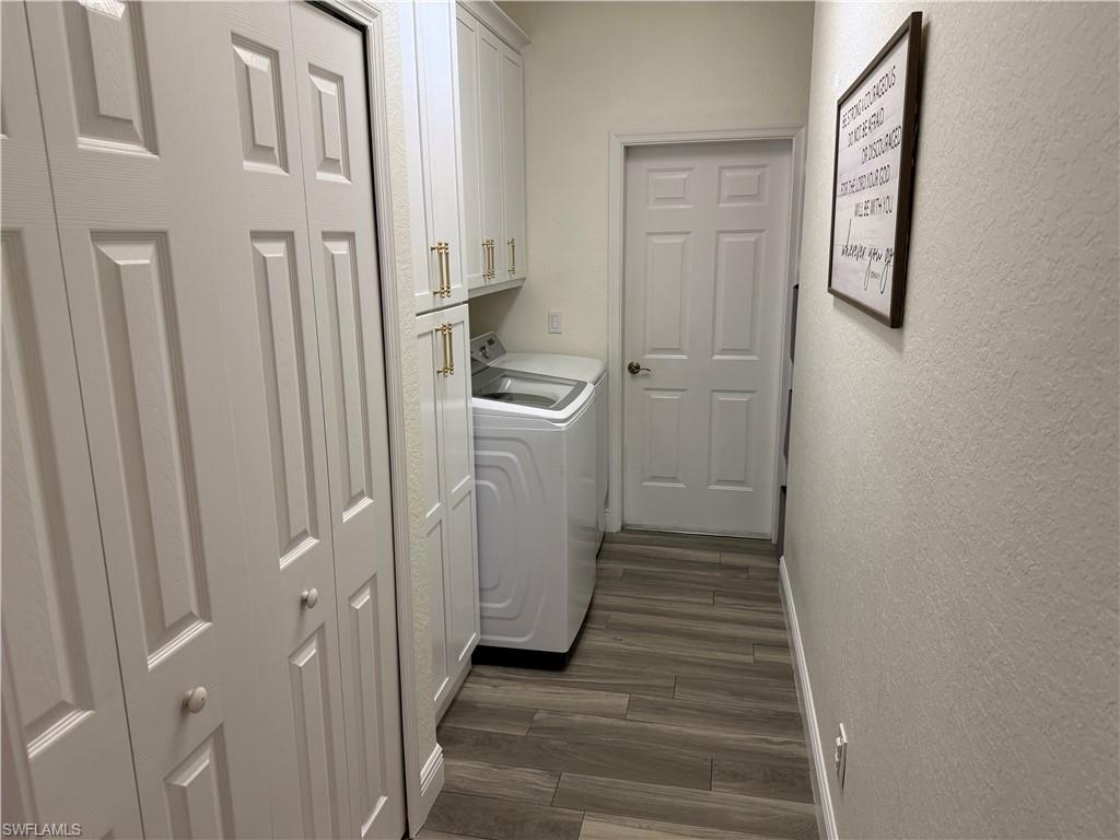 3944 Ruxton Road Naples, FL 34116 - Photo 22 of 27 a bathroom with a sink and mirror