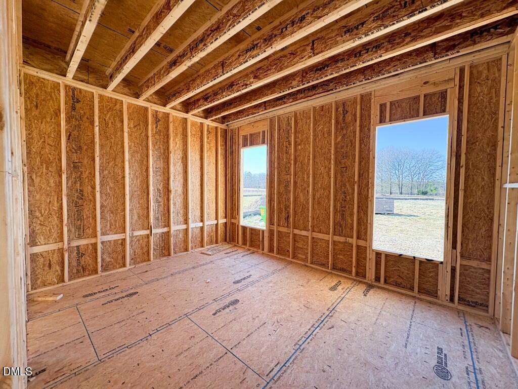 5824 Carriage Gate Drive Raleigh, NC 27603 - Photo 9 of 17 a view of an empty room with windows