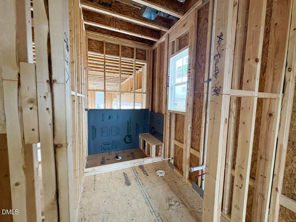 5824 Carriage Gate Drive Raleigh, NC 27603 - Photo 9 of 19 a bathroom with a tub and shower