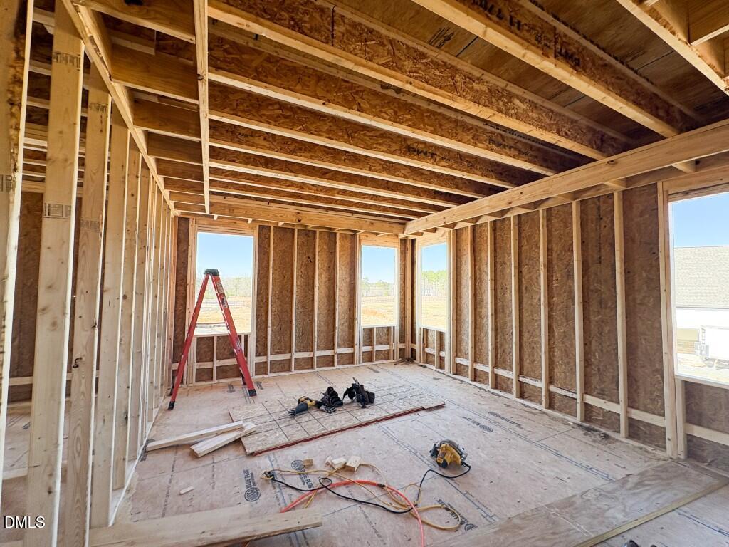 5824 Carriage Gate Drive Raleigh, NC 27603 - Photo 10 of 17 a view of a room with gym equipment