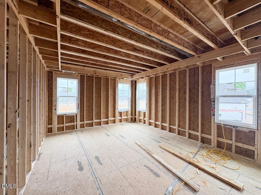 5824 Carriage Gate Drive Raleigh, NC 27603 - Photo 11 of 19 a view of an empty room with windows
