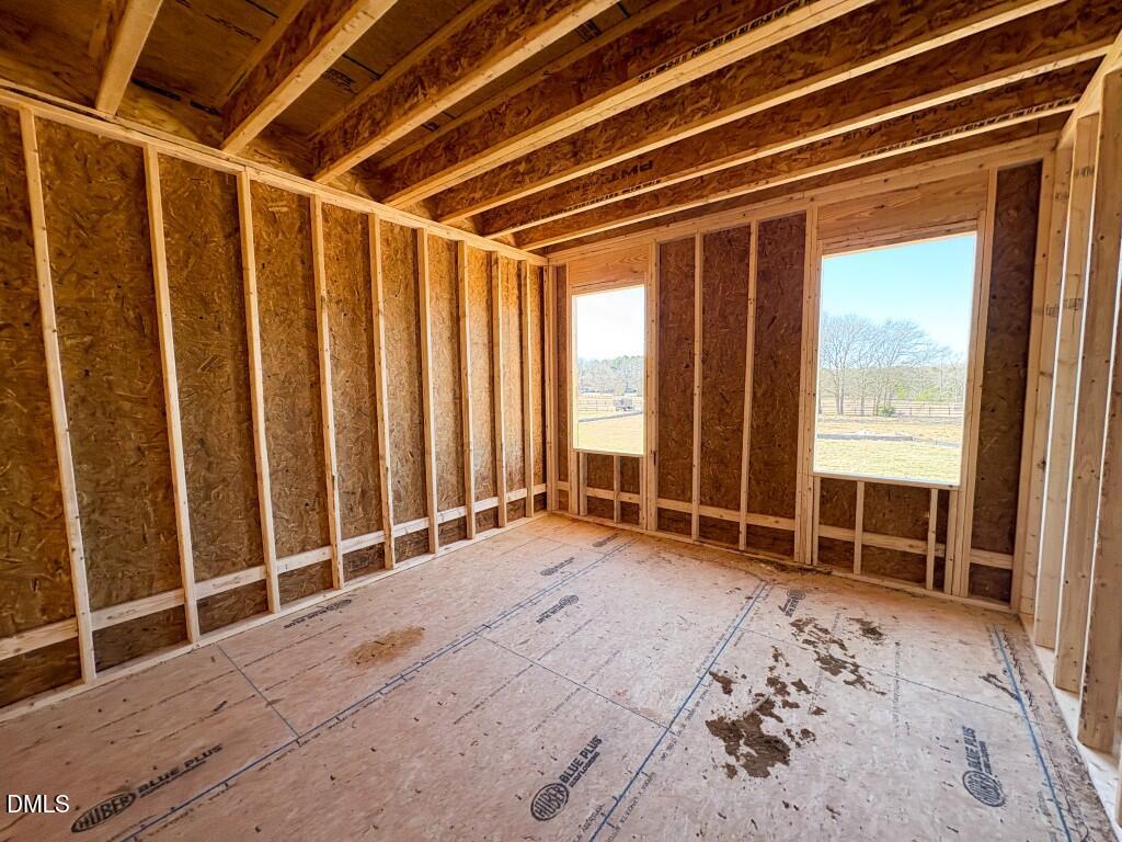 5824 Carriage Gate Drive Raleigh, NC 27603 - Photo 13 of 17 a view of an empty room with windows