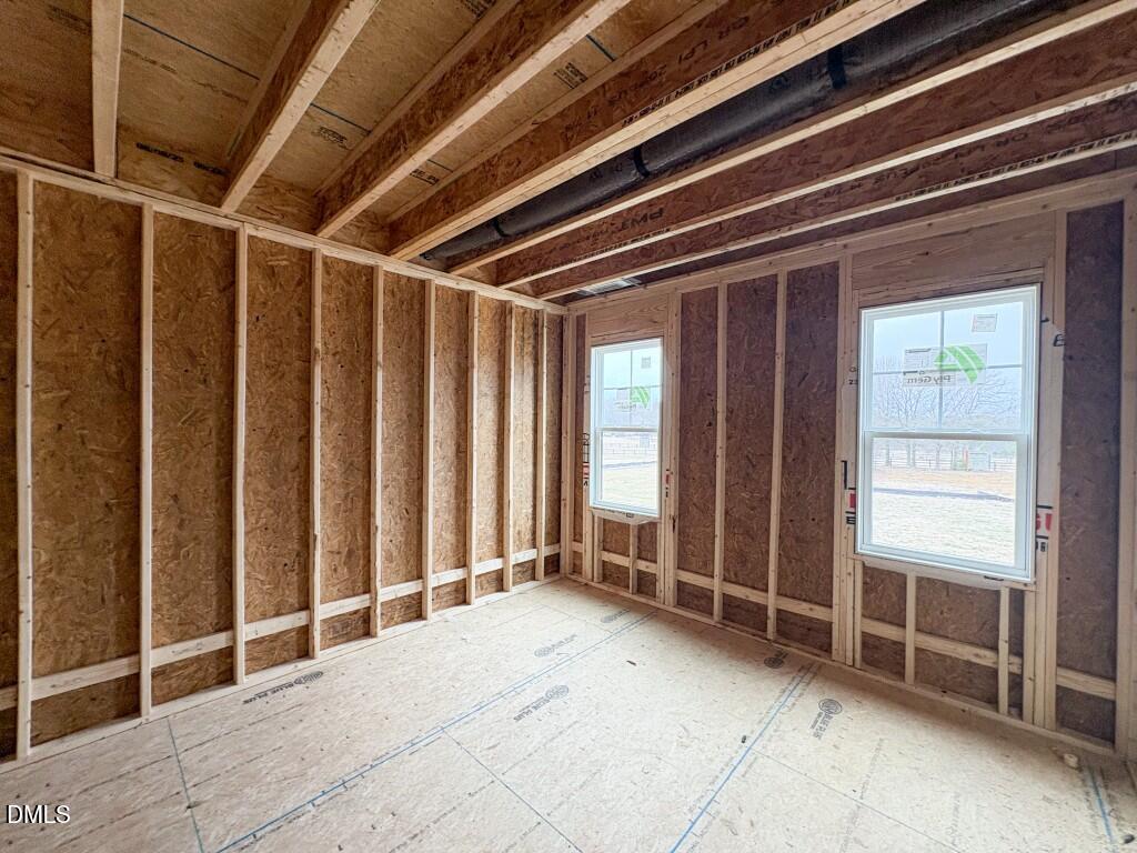 5824 Carriage Gate Drive Raleigh, NC 27603 - Photo 14 of 19 a view of an empty room with a window