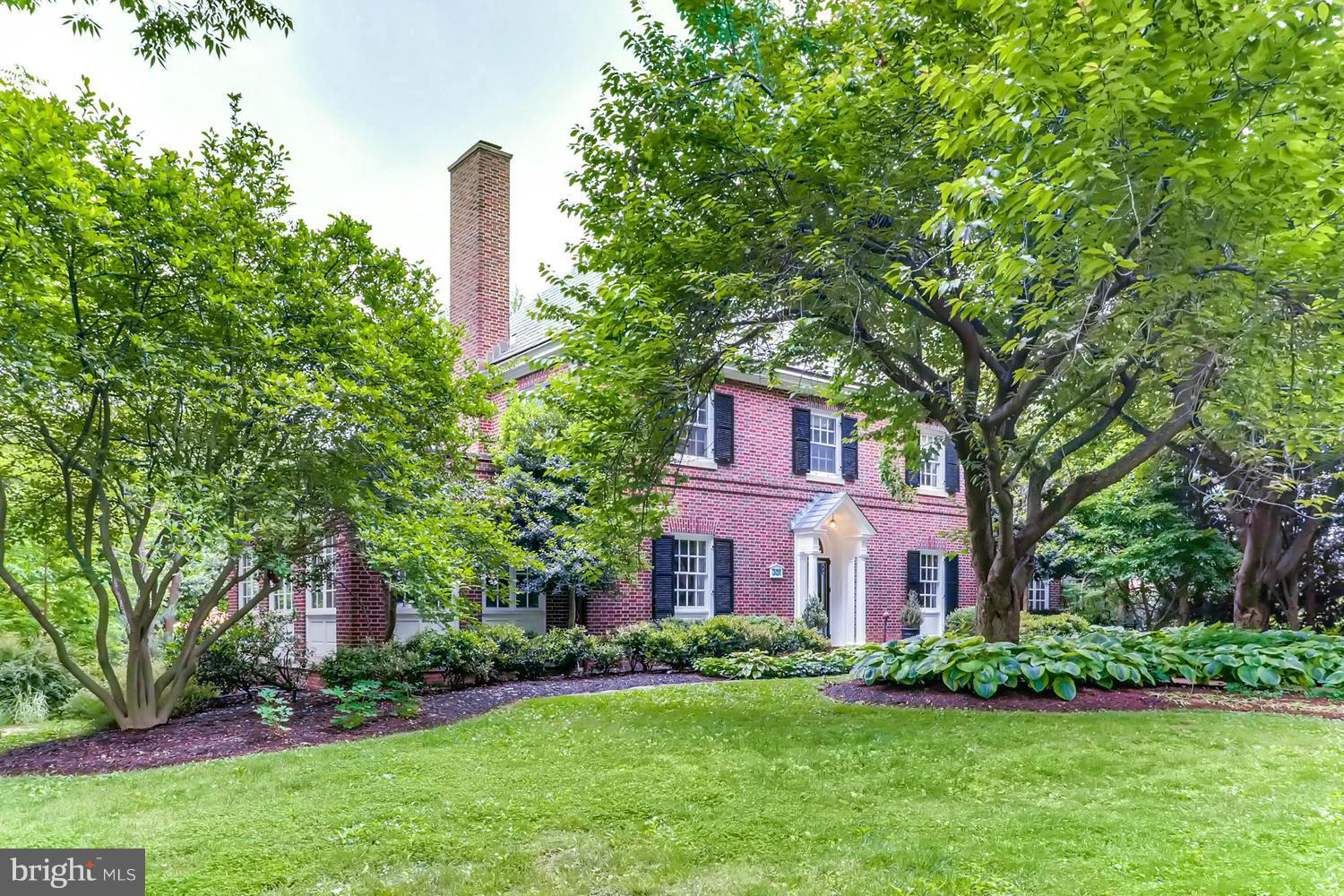 301 Somerset Road Baltimore, MD 21210 - Photo 2 of 30 a front view of a house with a garden