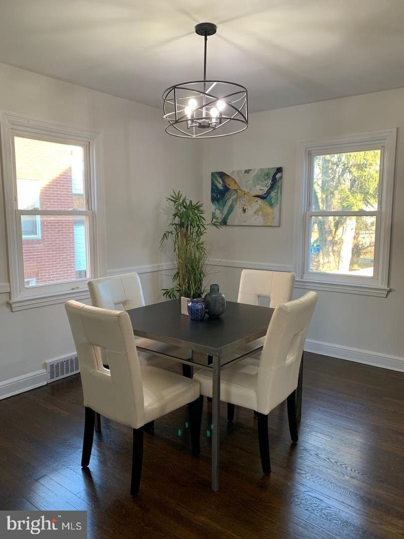 9407 Colesville Road Silver Spring, MD 20901 - Photo 12 of 47 Bright dining space with modern charm.