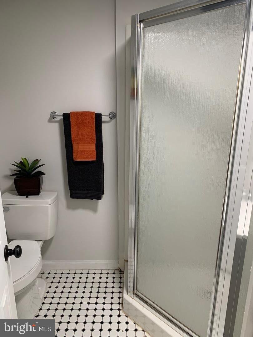 9407 Colesville Road Silver Spring, MD 20901 - Photo 25 of 43 Modern bathroom with sleek design elements.