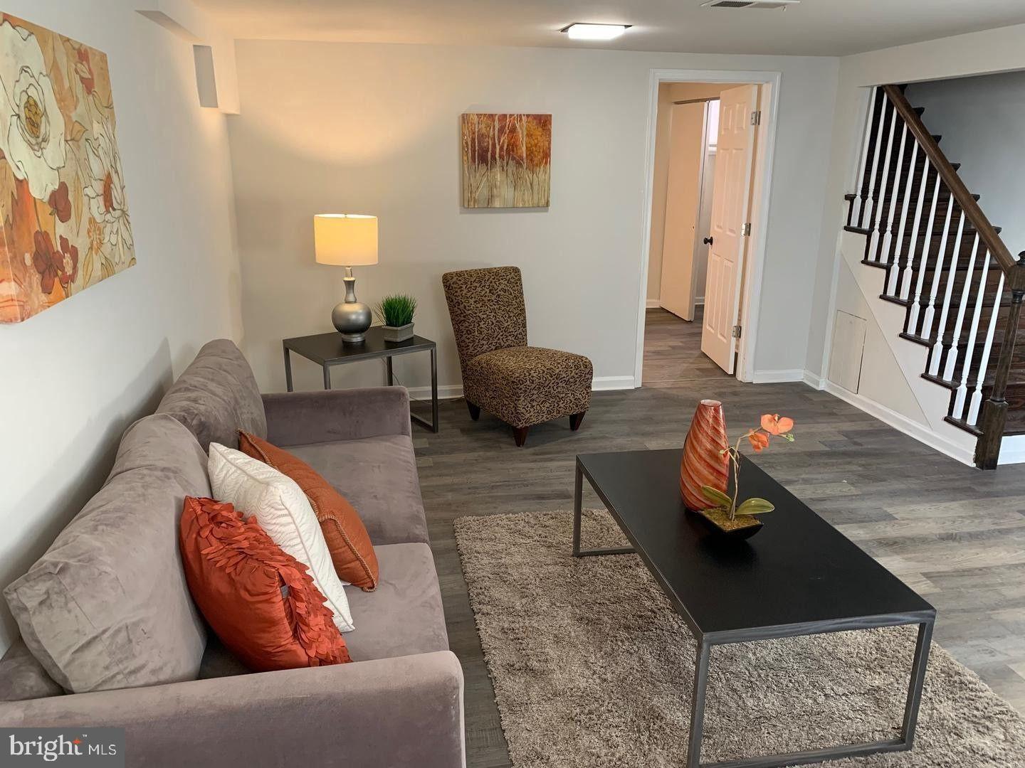 9407 Colesville Road Silver Spring, MD 20901 - Photo 29 of 43 Modern living space with warm accents.