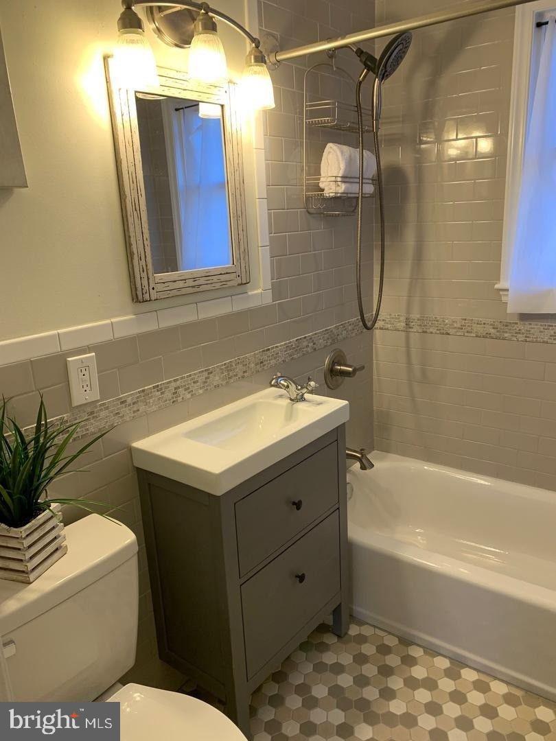 9407 Colesville Road Silver Spring, MD 20901 - Photo 37 of 47 Modern bathroom with stylish fixtures.