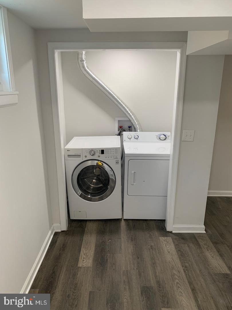 9407 Colesville Road Silver Spring, MD 20901 - Photo 38 of 47 Efficient laundry nook in modern design.