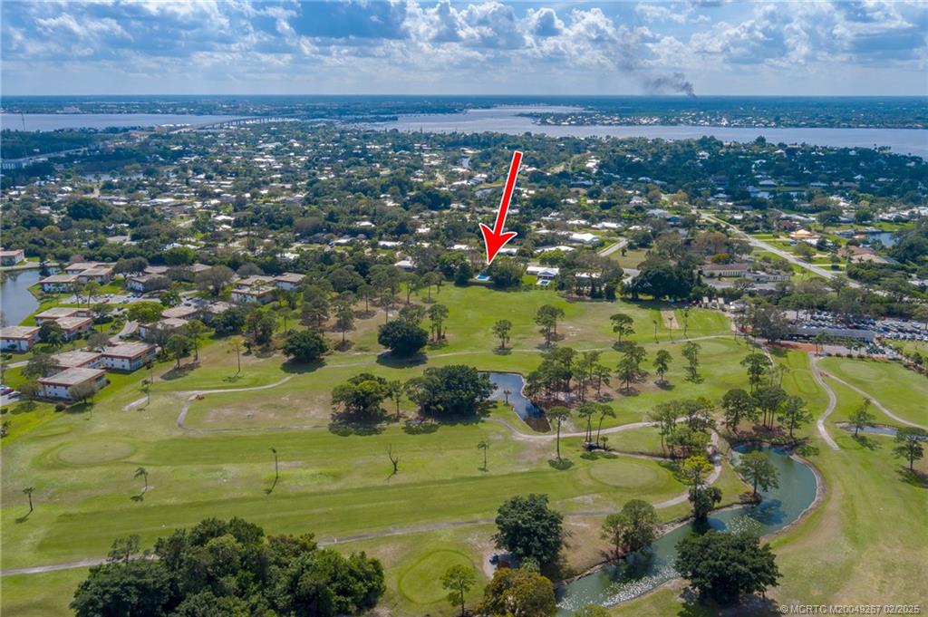 1743 Northwest Spruce Ridge Drive Stuart, FL 34994 - Photo 31 of 31 a view of a yard with an outdoor space