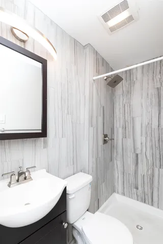 a view of a brick building with windows