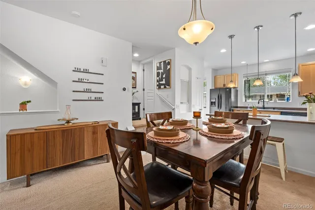 a view of a dining room and chandelier