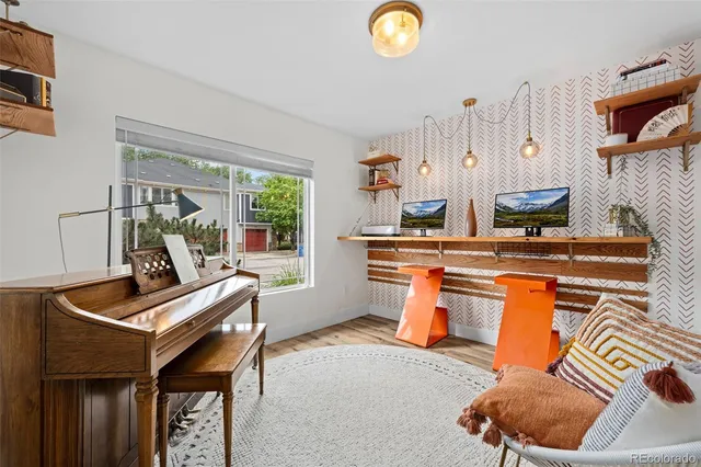 a room with furniture and a fireplace